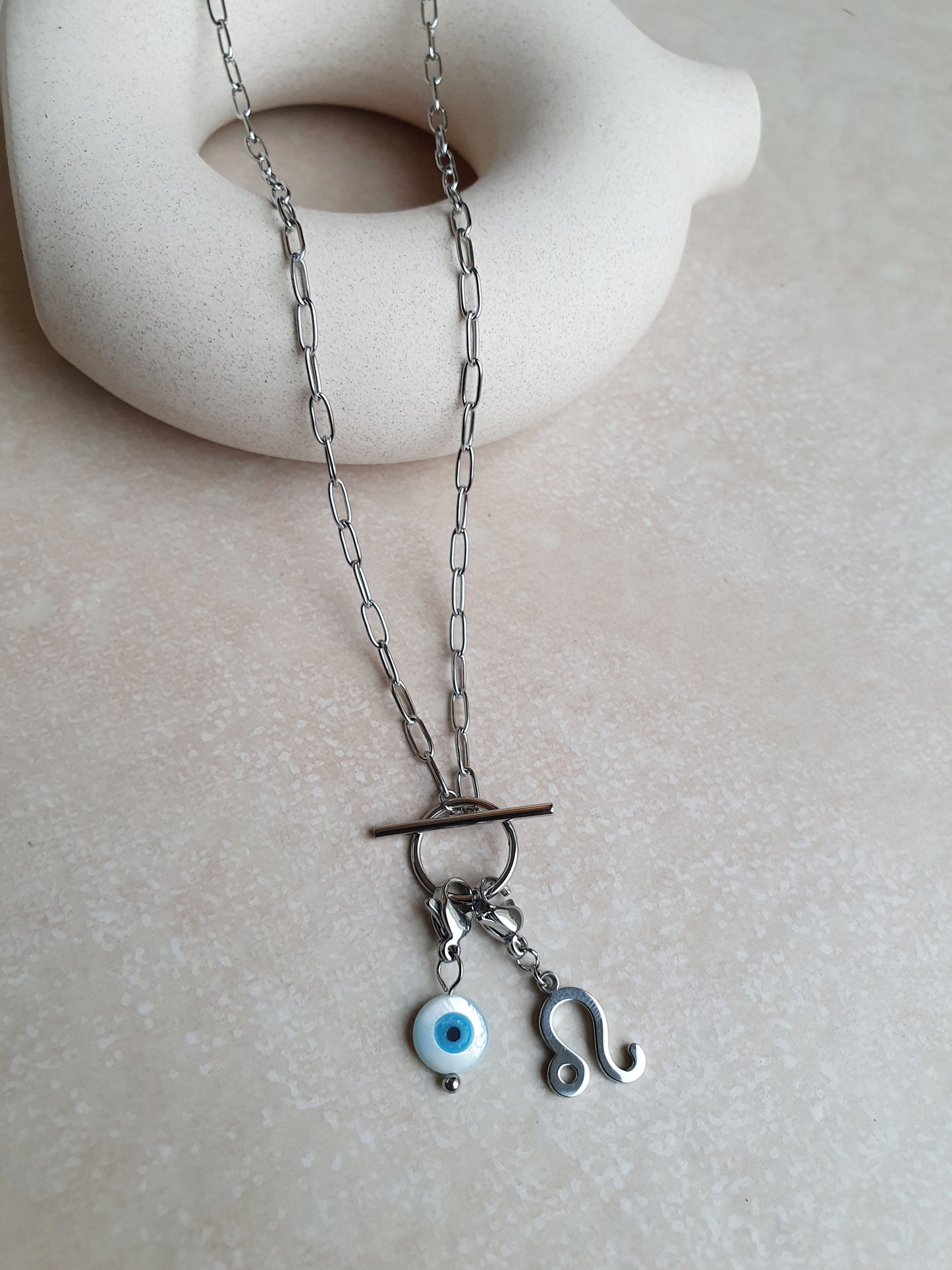 Charm oeil en nacre - argenté