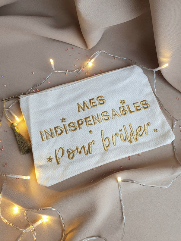 Pochette brodée "Mes indispensables pour briller" à pompon - écru