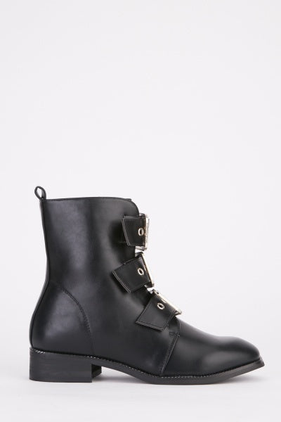 Bottines noires similicuir boucles argentées